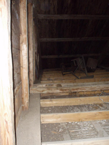 Town House bow in beam in attic